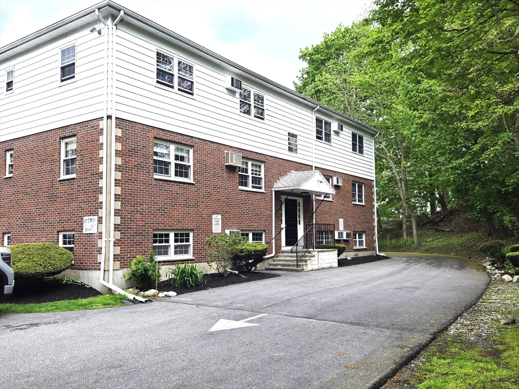 6 Venice Street, Unit F2 Danvers, MA 01923 - Photo 17 of 19 a view of a house with a patio