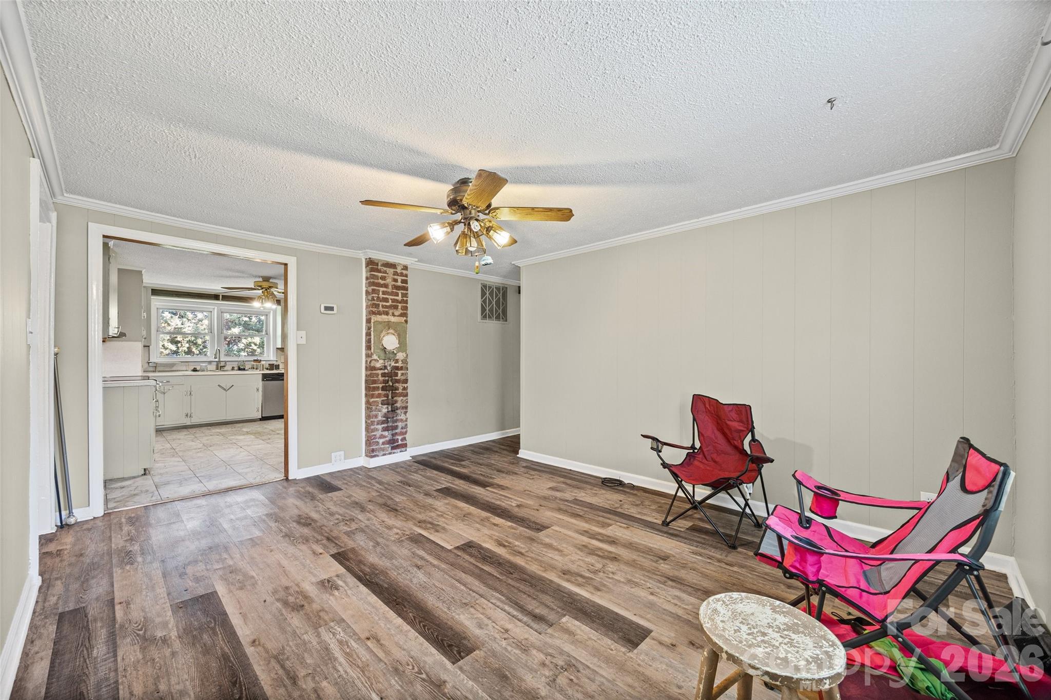 1315 Lithia Springs Road Shelby, NC 28150 - Photo 19 of 25 a view of a room with wooden floor fan and windows