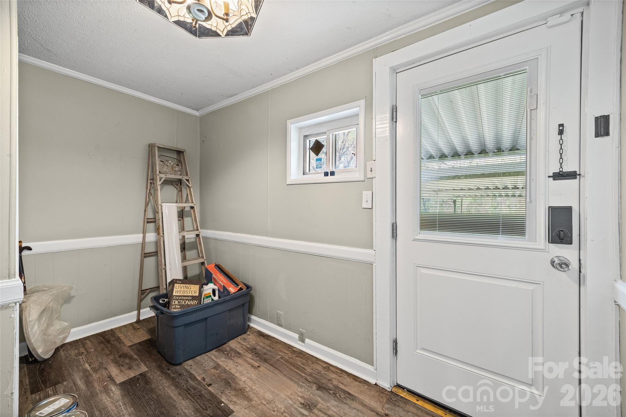 1315 Lithia Springs Road Shelby, NC 28150 - Photo 20 of 25 a room with painting on the wall and a window