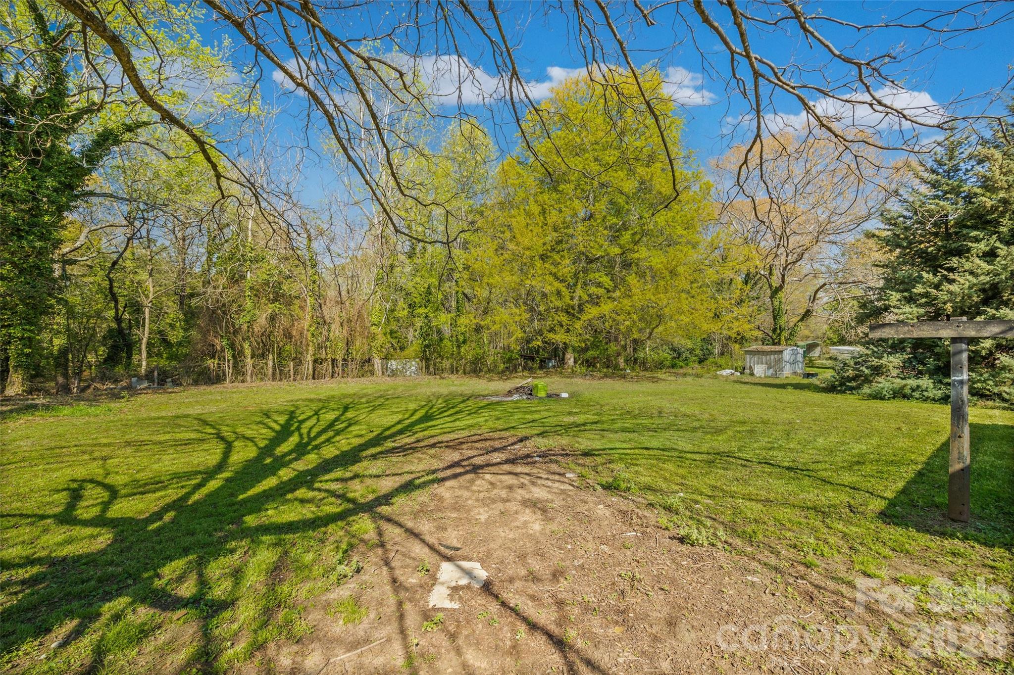 1315 Lithia Springs Road Shelby, NC 28150 - Photo 24 of 25 a view of a yard with basketball court