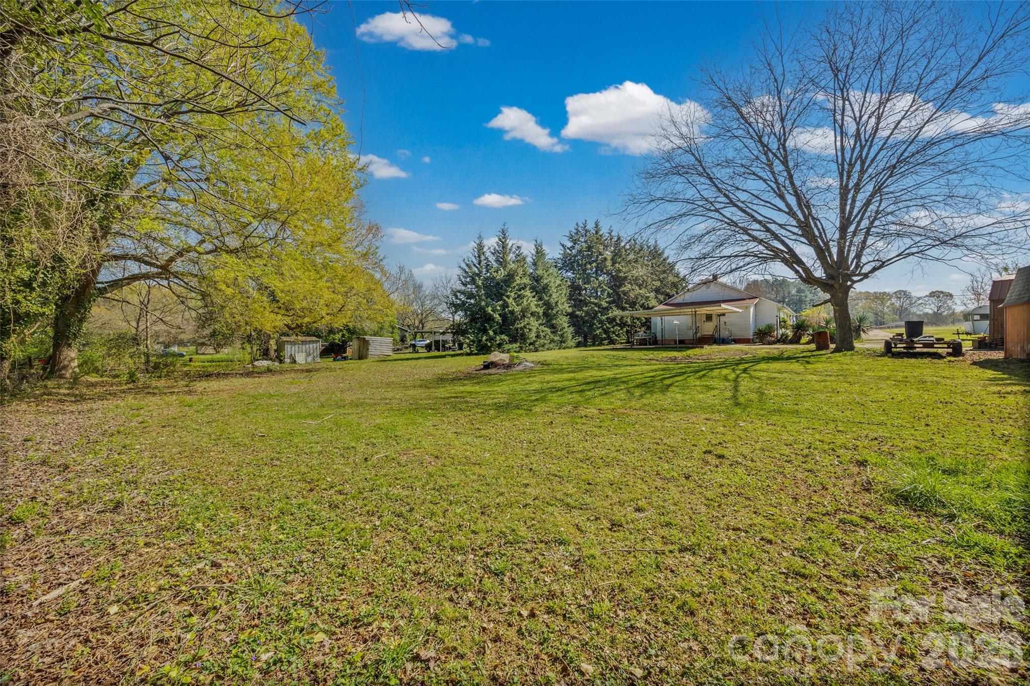 1315 Lithia Springs Road Shelby, NC 28150 - Photo 25 of 25 a view of a field with an trees