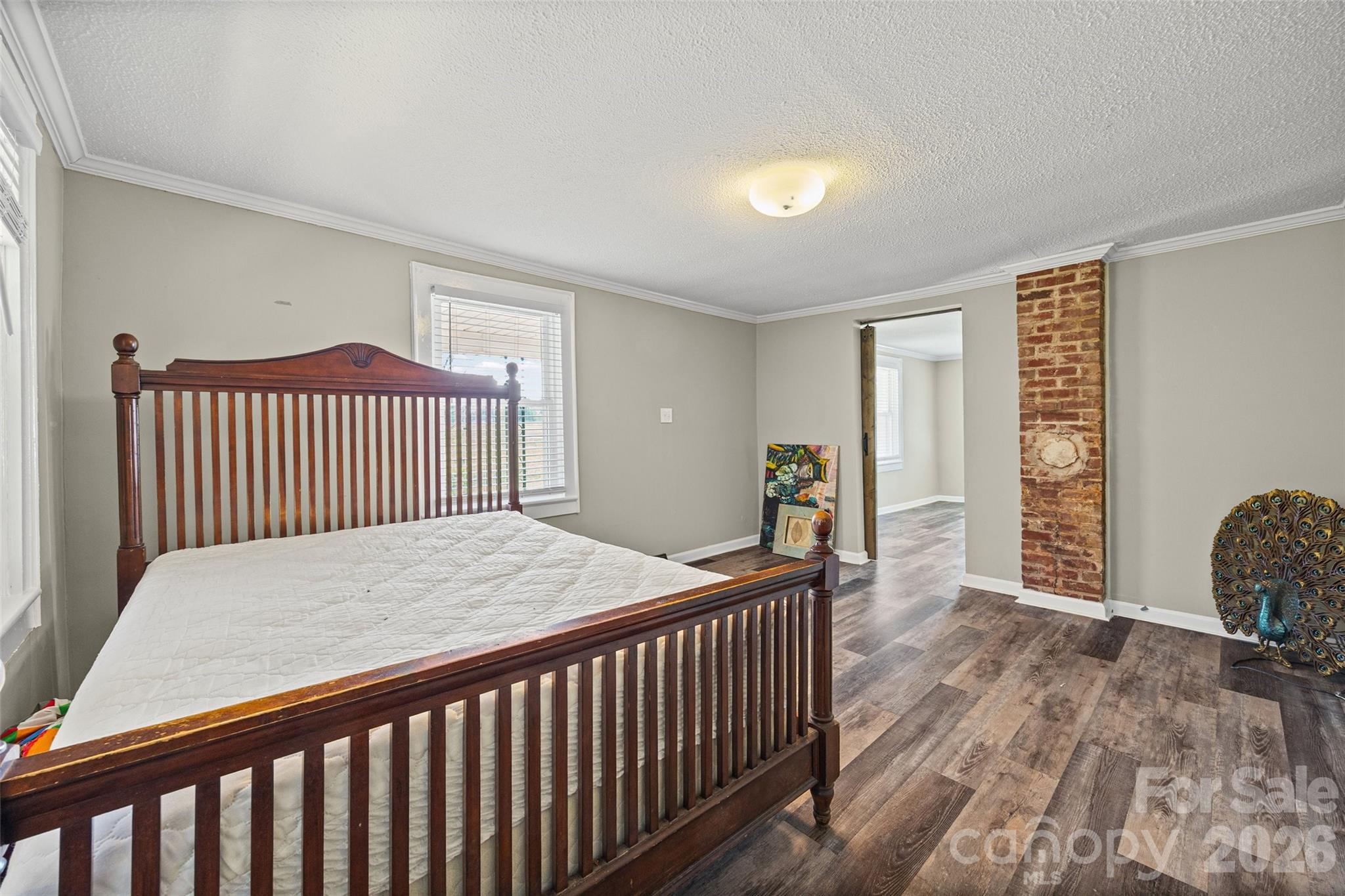 1315 Lithia Springs Road Shelby, NC 28150 - Photo 8 of 25 a bedroom with a bed and wooden floor