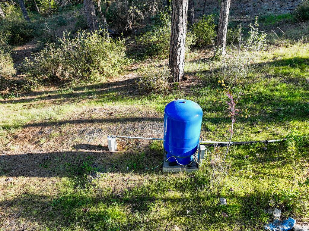 13279 Thoroughbred Loop Grass Valley, CA 95949 - Photo 22 of 33 a view of a garden with a fountain