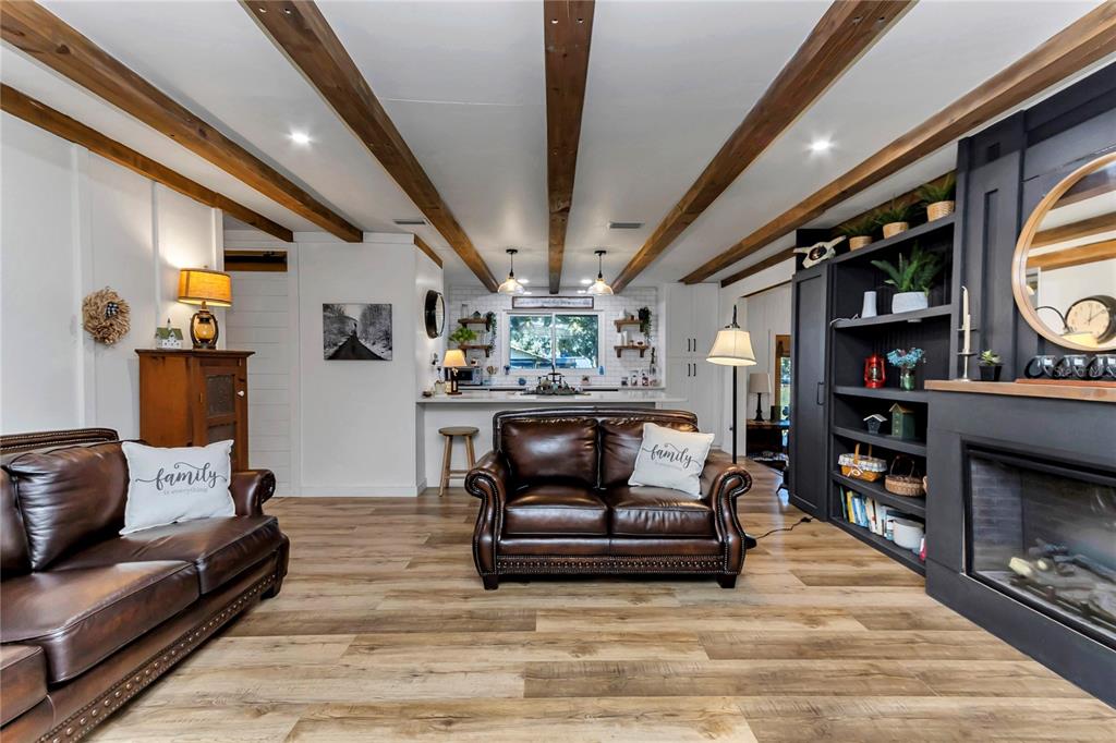 13232 Northeast 39th Terrace Anthony, FL 32617 - Photo 6 of 55 a living room with furniture and a fireplace