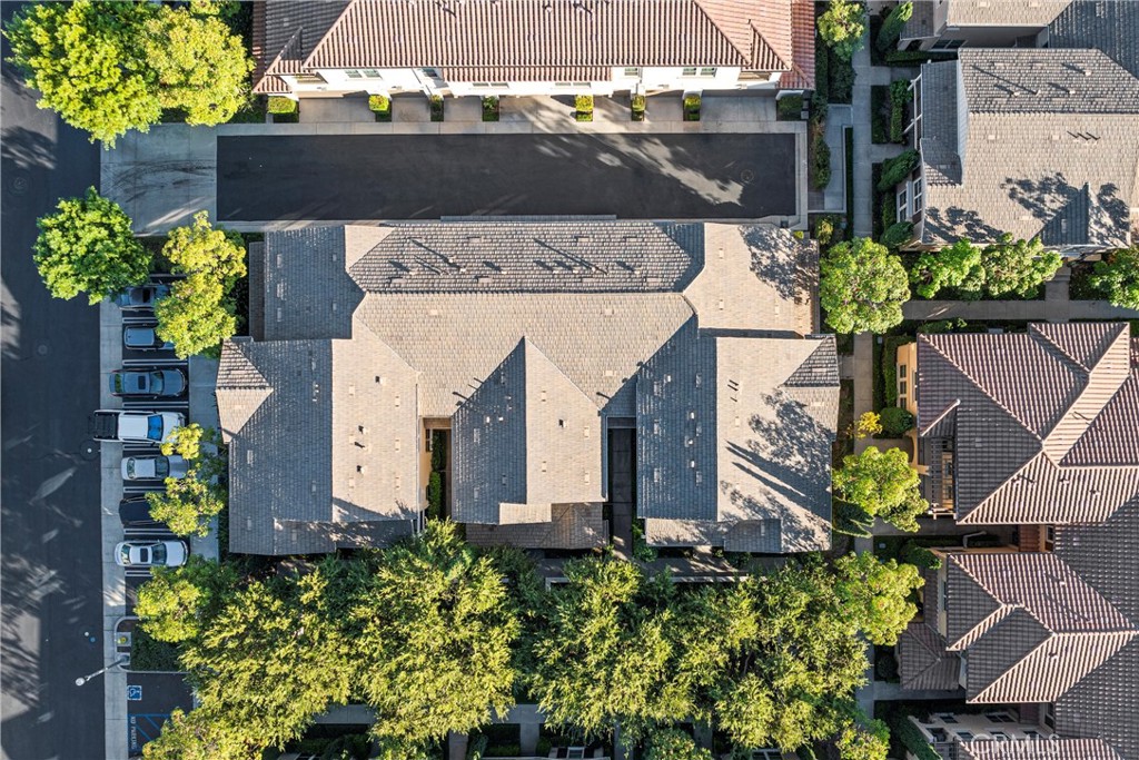 52 Bijou Irvine, CA 92618 - Photo 28 of 33 Lush landscaping and mature trees keep the home cool ~