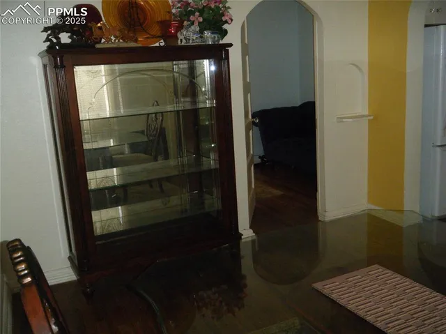 a bathroom with a glass shower door