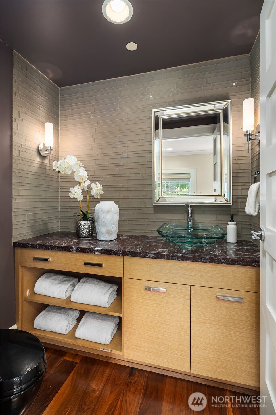 8910 Northeast 33rd Street Yarrow Point, WA 98004 - Photo 14 of 38 a bathroom with a sink and a mirror