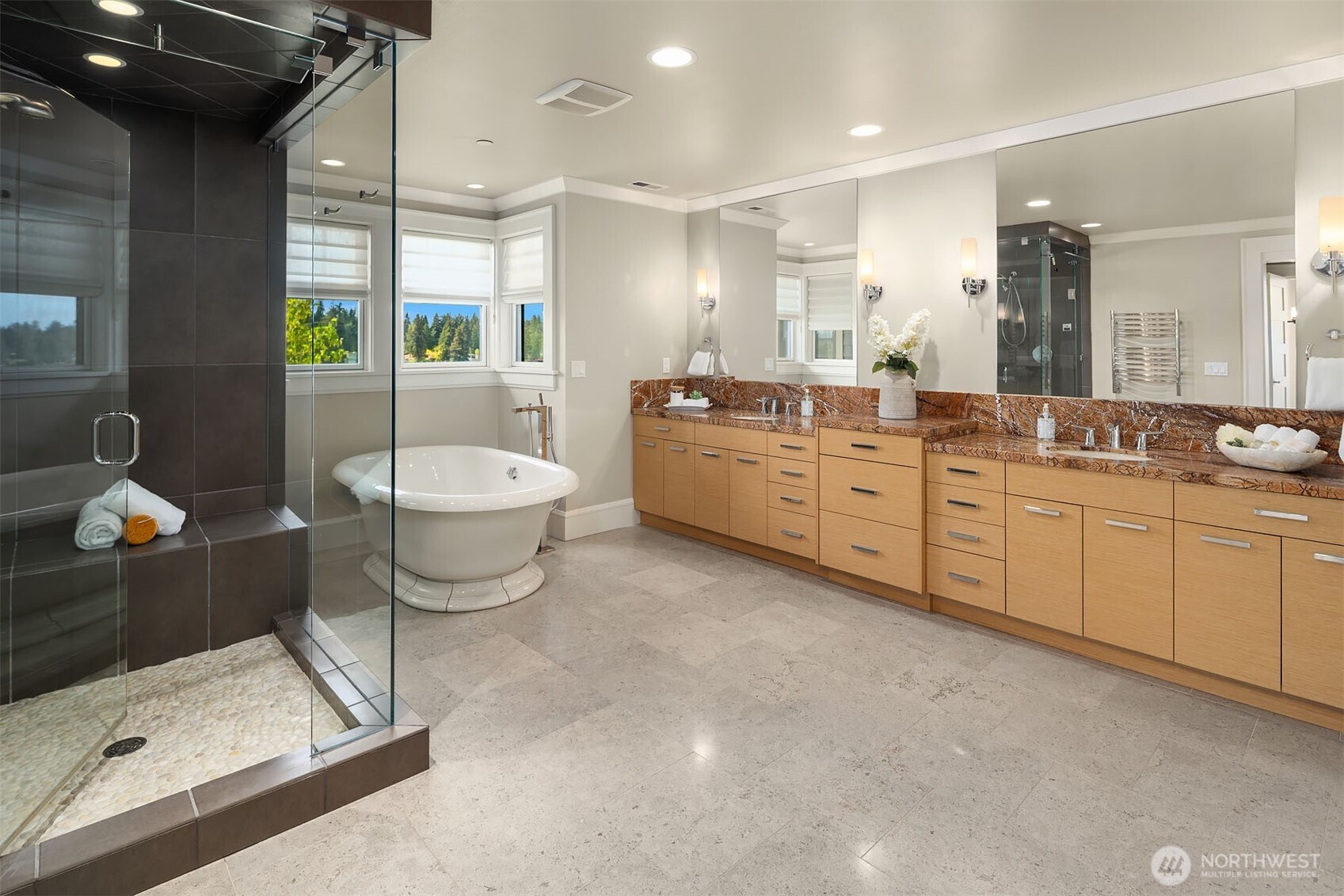 8910 Northeast 33rd Street Yarrow Point, WA 98004 - Photo 19 of 38 a large bathroom with a double vanity sink a mirror and a bathtub