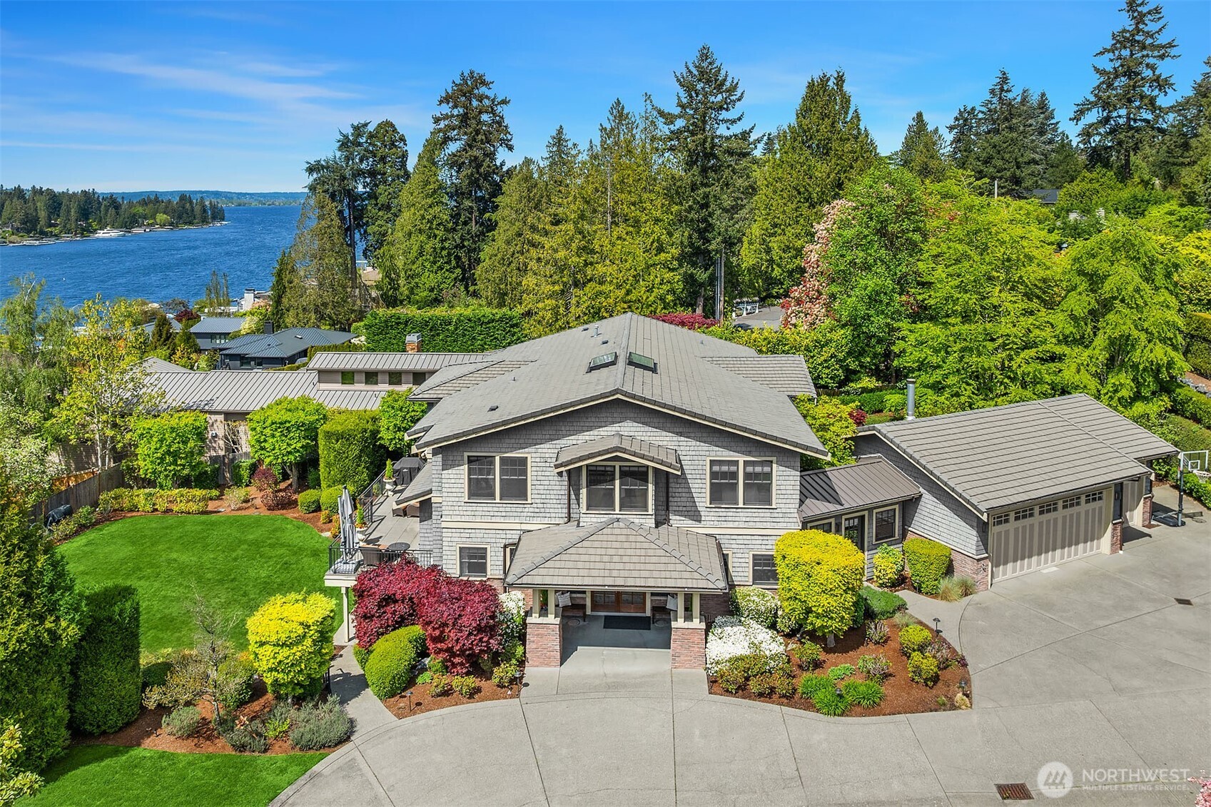 8910 Northeast 33rd Street Yarrow Point, WA 98004 - Photo 2 of 38 a house with garden in front of it
