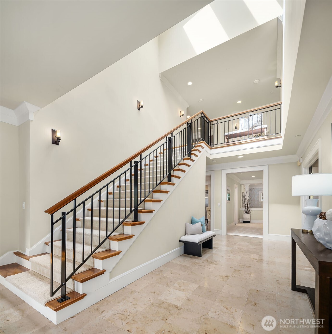 8910 Northeast 33rd Street Yarrow Point, WA 98004 - Photo 3 of 38 a view of staircase with white walls and windows