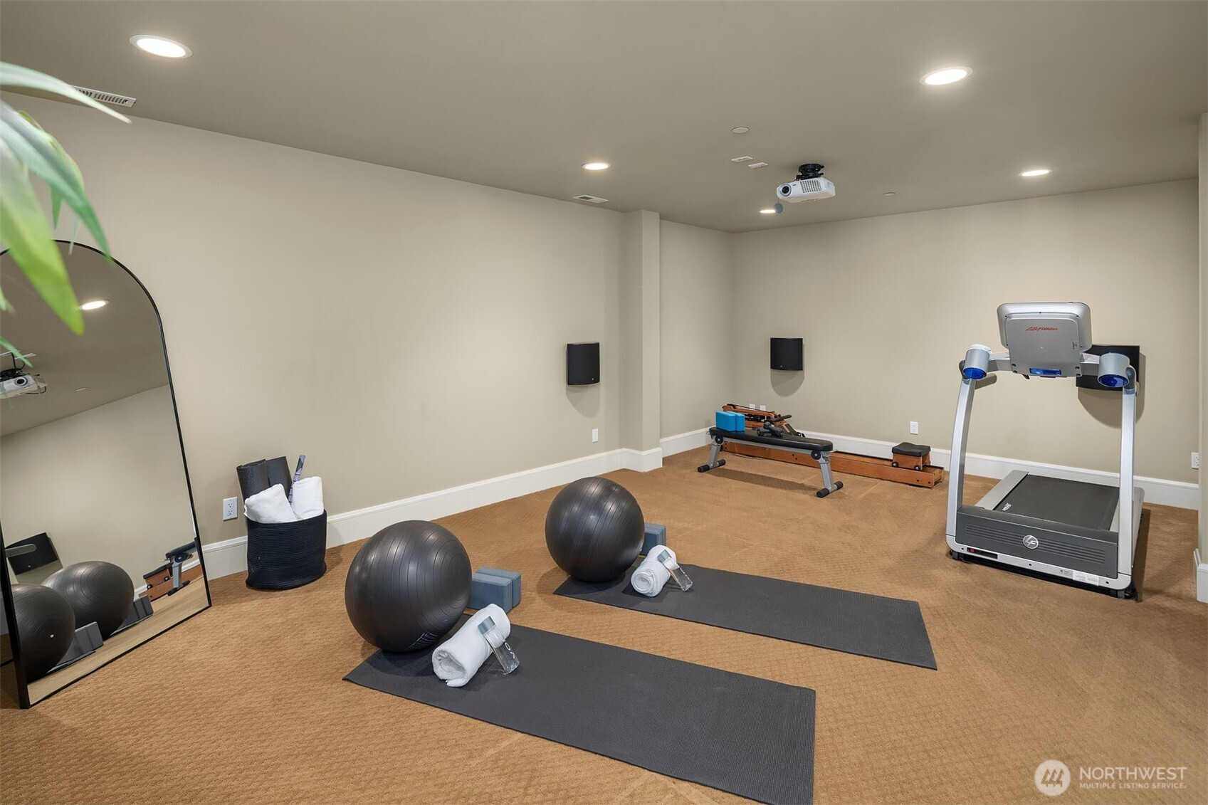 8910 Northeast 33rd Street Yarrow Point, WA 98004 - Photo 32 of 38 a room with a table and gym equipment