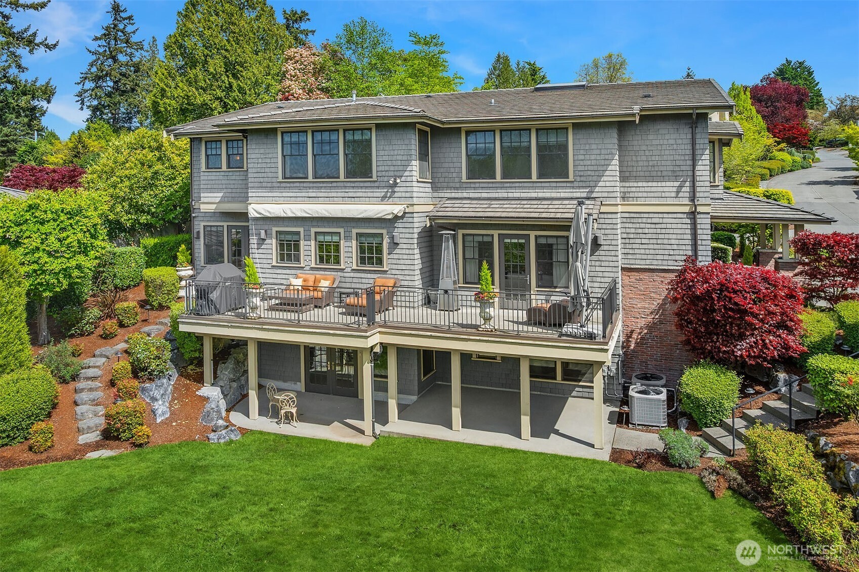 8910 Northeast 33rd Street Yarrow Point, WA 98004 - Photo 36 of 38 a view of house with a yard