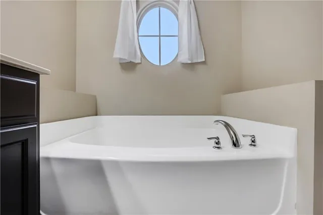 a bathroom with a bathtub