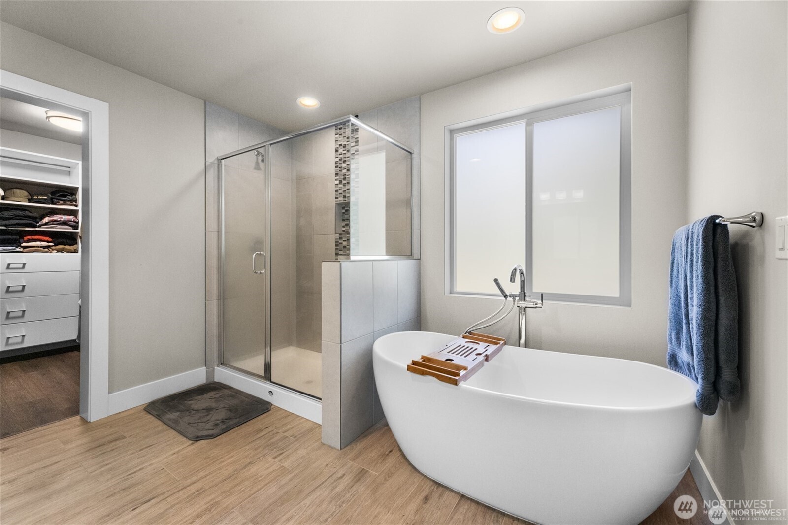 7780 53rd Place Gig Harbor, WA 98335 - Photo 19 of 39 a bathroom with a bathtub and a shower