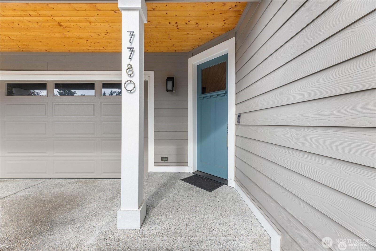 7780 53rd Place Gig Harbor, WA 98335 - Photo 30 of 39 a view of front door and potted plants