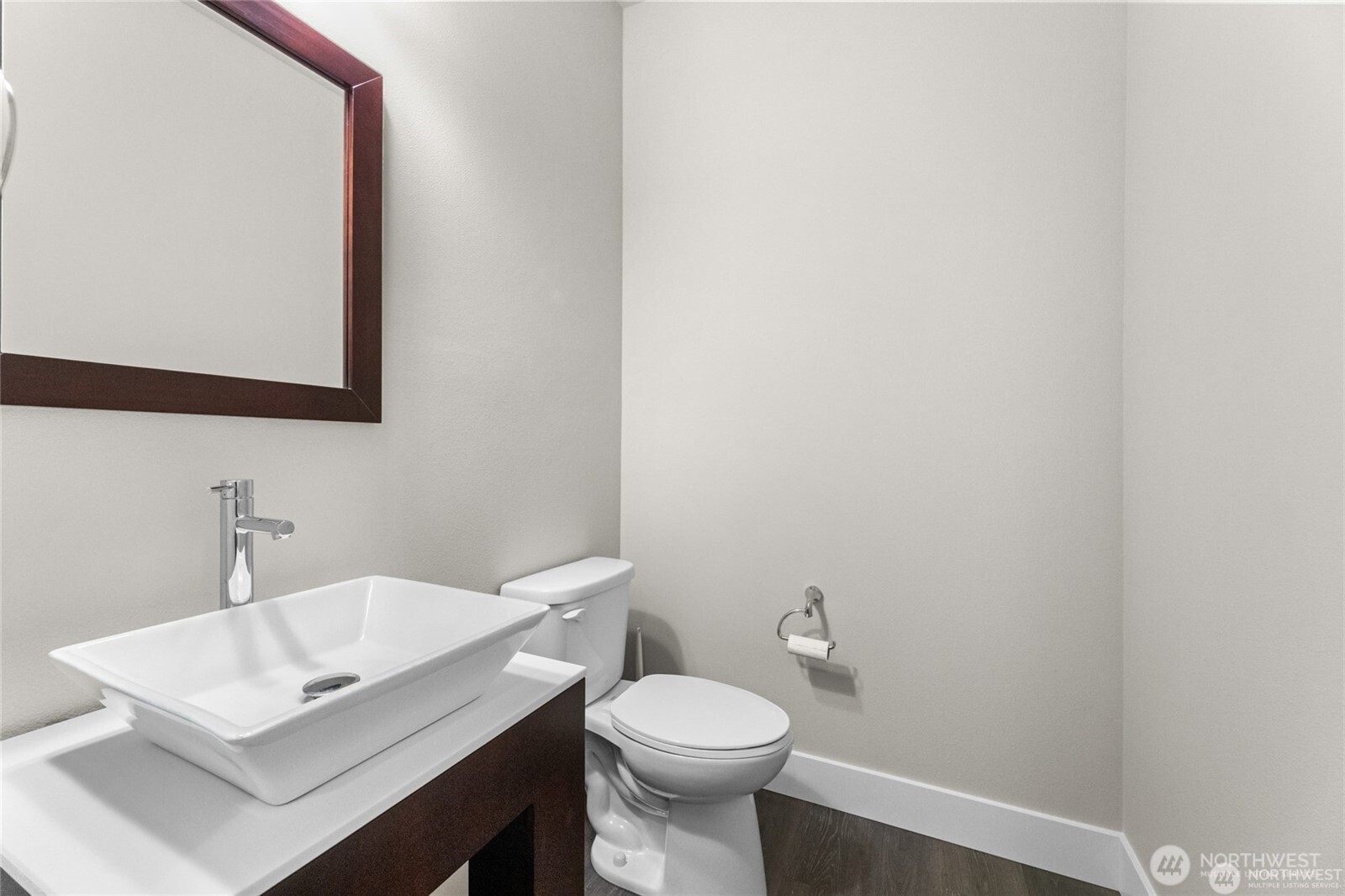7780 53rd Place Gig Harbor, WA 98335 - Photo 4 of 39 a bathroom with a sink a toilet and mirror