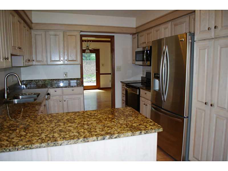 407 Landon Gate Pittsburgh, PA 15215 - Photo 12 of 25 Kitchen. L shaped counter for easy serving.