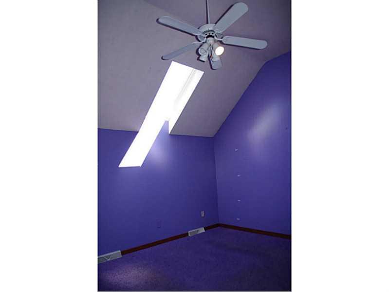 407 Landon Gate Pittsburgh, PA 15215 - Photo 24 of 25 Bedroom. 3rd floor bedroom features skylight, vaulted ceiling and fan.