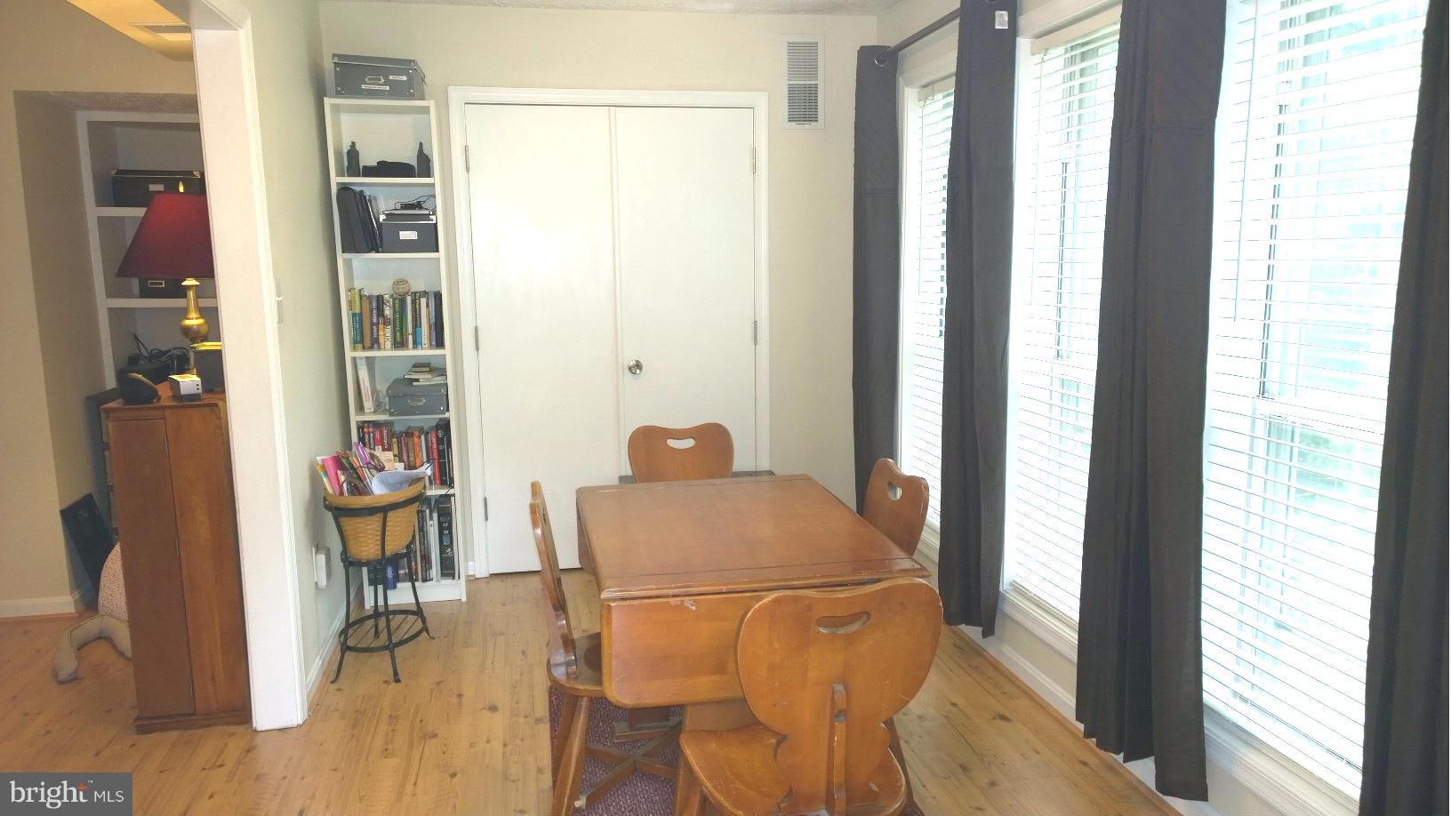9927 Oakton Terrace Road, Unit 9927 Oakton, VA 22124 - Photo 15 of 19 a room with furniture and a window