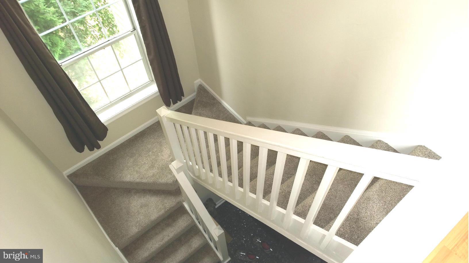 9927 Oakton Terrace Road, Unit 9927 Oakton, VA 22124 - Photo 5 of 19 a view of wooden floor