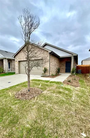a house view with a garden space