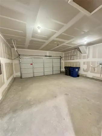 a view of an empty room with a yard