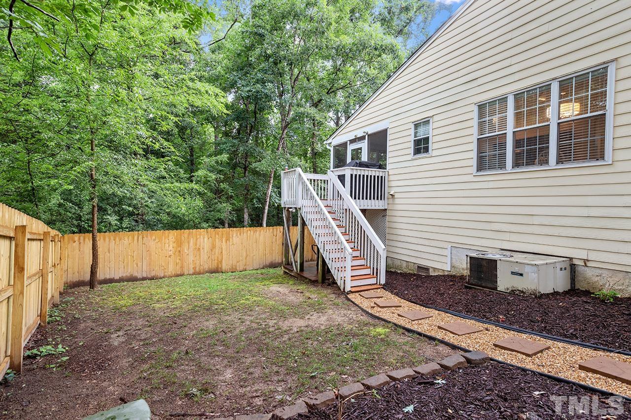 4433 Labrador Drive Raleigh, NC 27616 - Photo 28 of 30 a view of a house with a yard and sitting area
