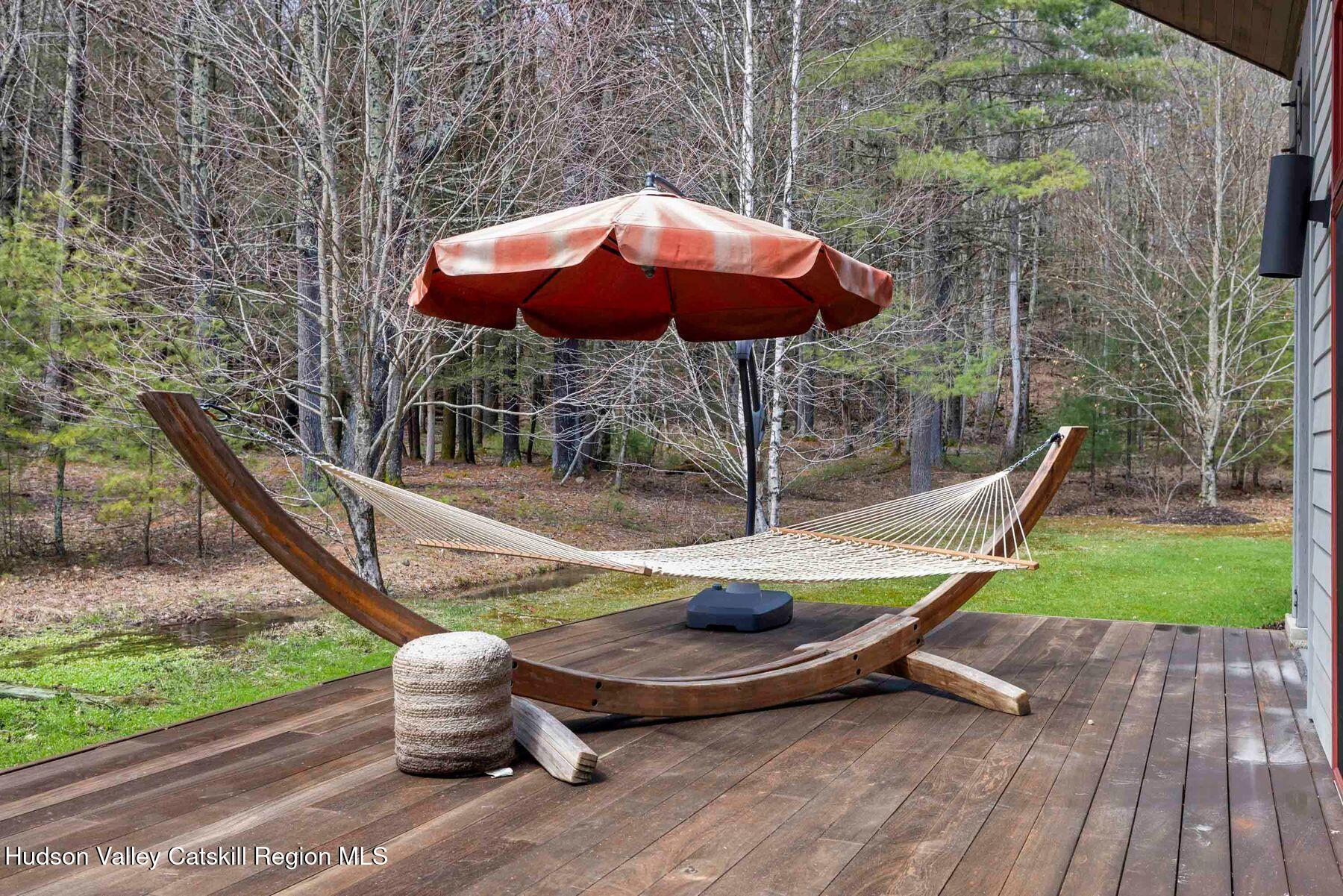 41 Shultis Farm Road Bearsville, NY 12409 - Photo 11 of 47 a view of backyard with swimming pool and outdoor seating