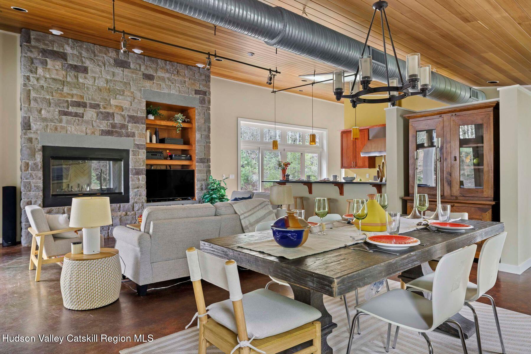 41 Shultis Farm Road Bearsville, NY 12409 - Photo 12 of 47 a view of a dining room with furniture window and outside view