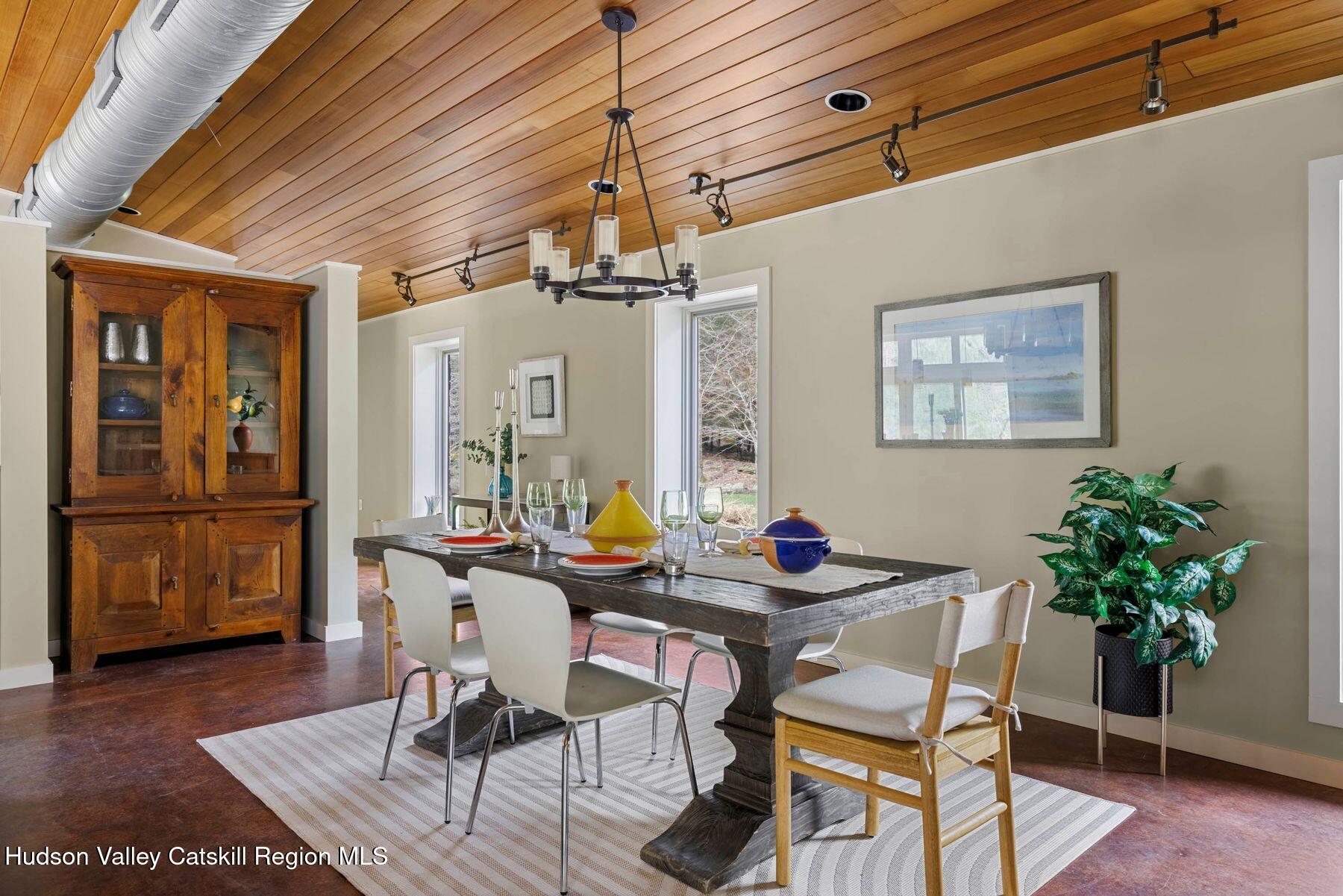 41 Shultis Farm Road Bearsville, NY 12409 - Photo 13 of 47 a dining room with furniture and wooden floor