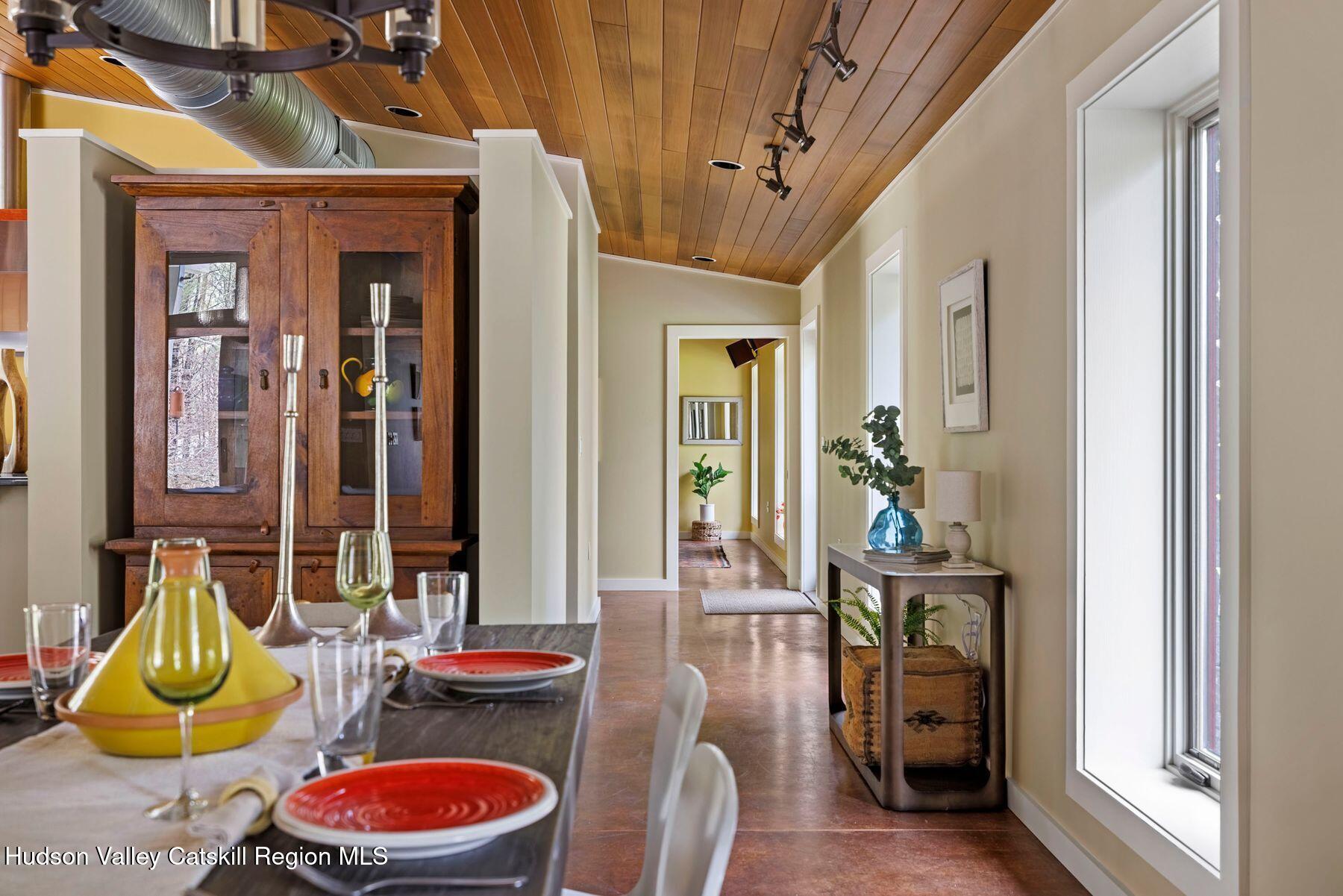 41 Shultis Farm Road Bearsville, NY 12409 - Photo 14 of 47 a dining room with furniture and wooden floor