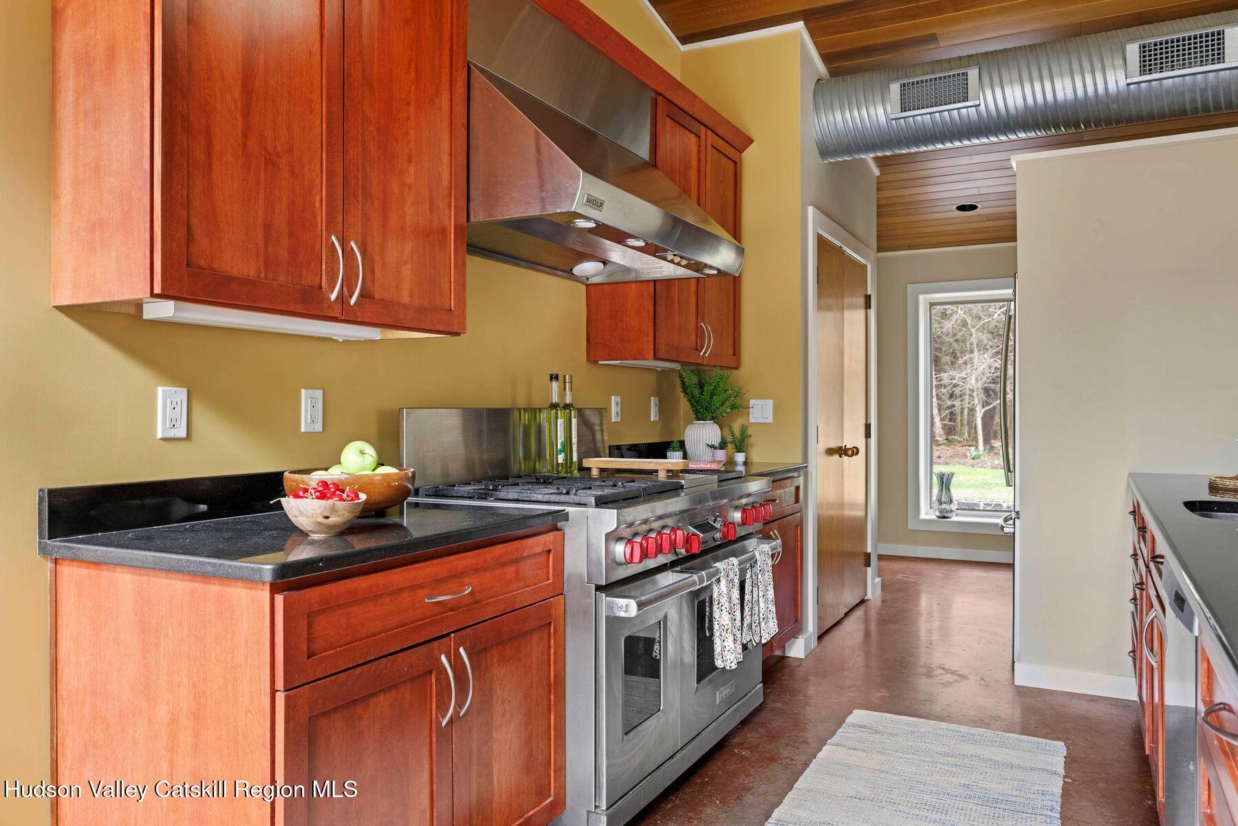 41 Shultis Farm Road Bearsville, NY 12409 - Photo 17 of 47 a kitchen with stainless steel appliances granite countertop a stove and a sink