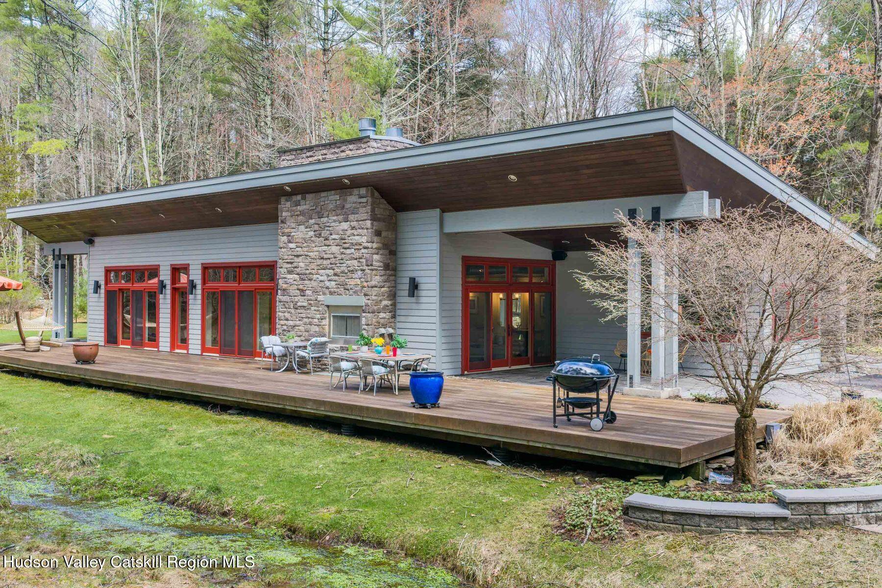 41 Shultis Farm Road Bearsville, NY 12409 - Photo 2 of 47 a front view of house with yard outdoor seating and barbeque oven