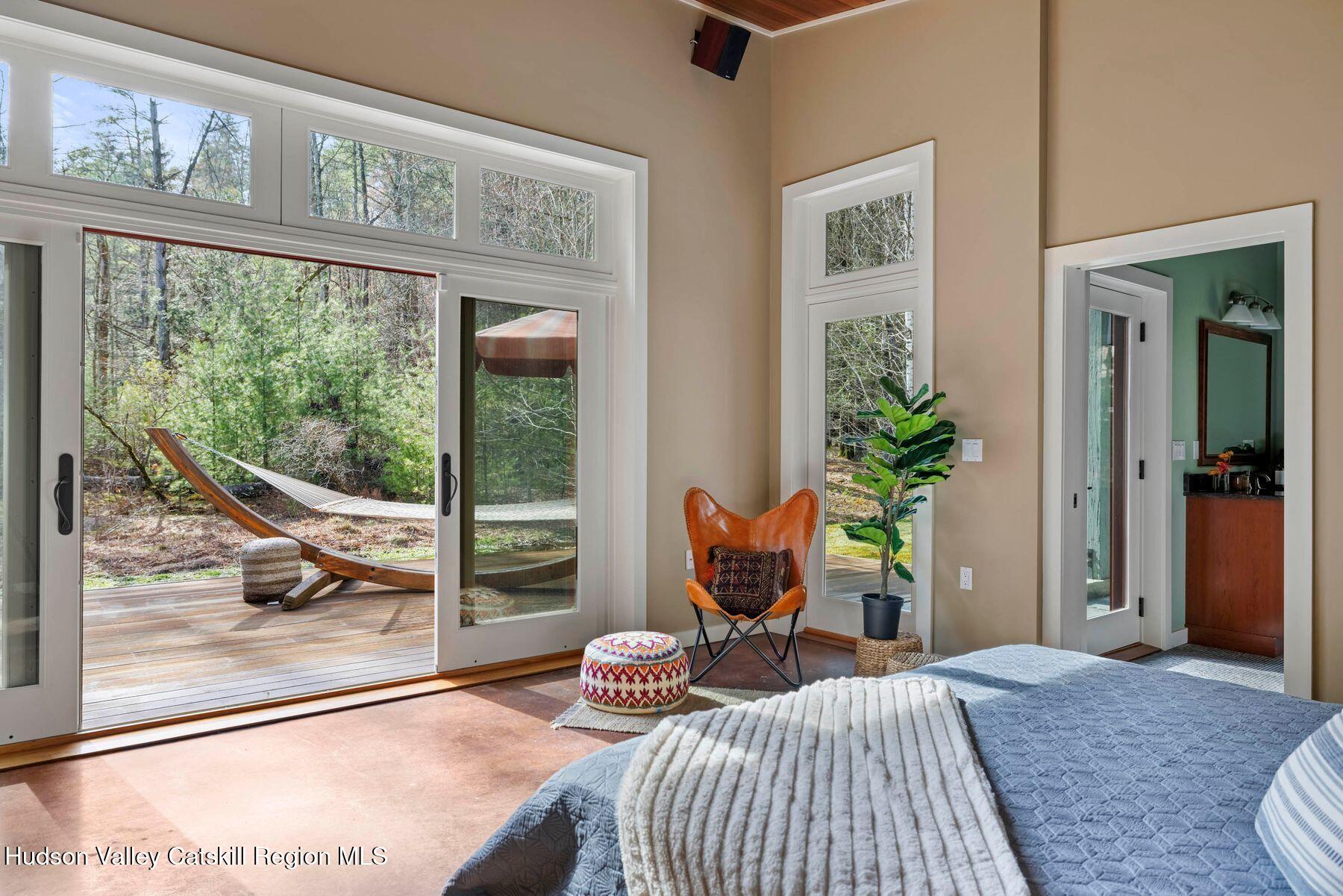 41 Shultis Farm Road Bearsville, NY 12409 - Photo 22 of 47 a bedroom with furniture and a window