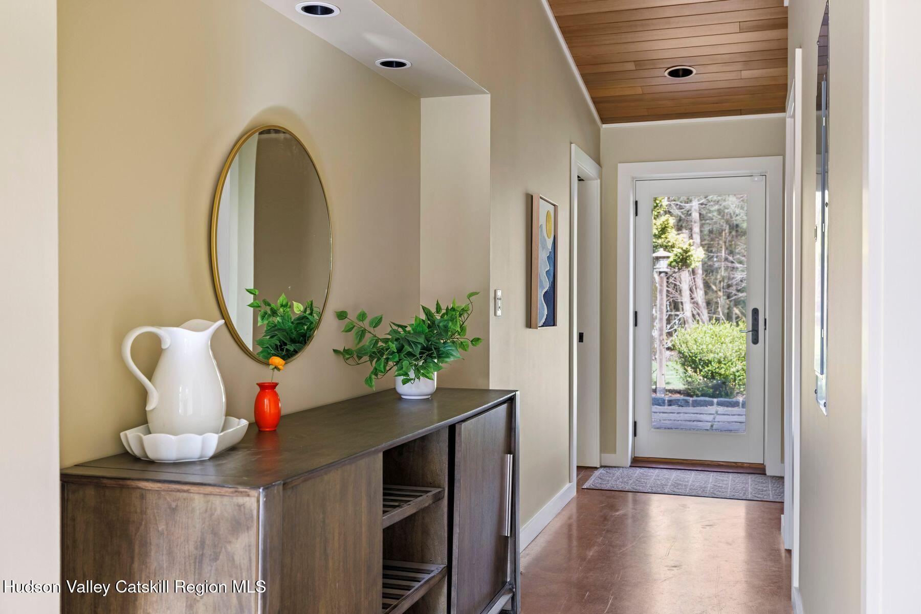 41 Shultis Farm Road Bearsville, NY 12409 - Photo 26 of 47 a front view of a house with wooden floor and potted plant