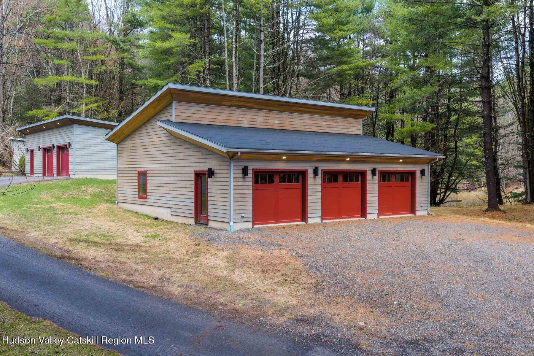 41 Shultis Farm Road Bearsville, NY 12409 - Photo 36 of 47 a front view of a house with a yard and garage