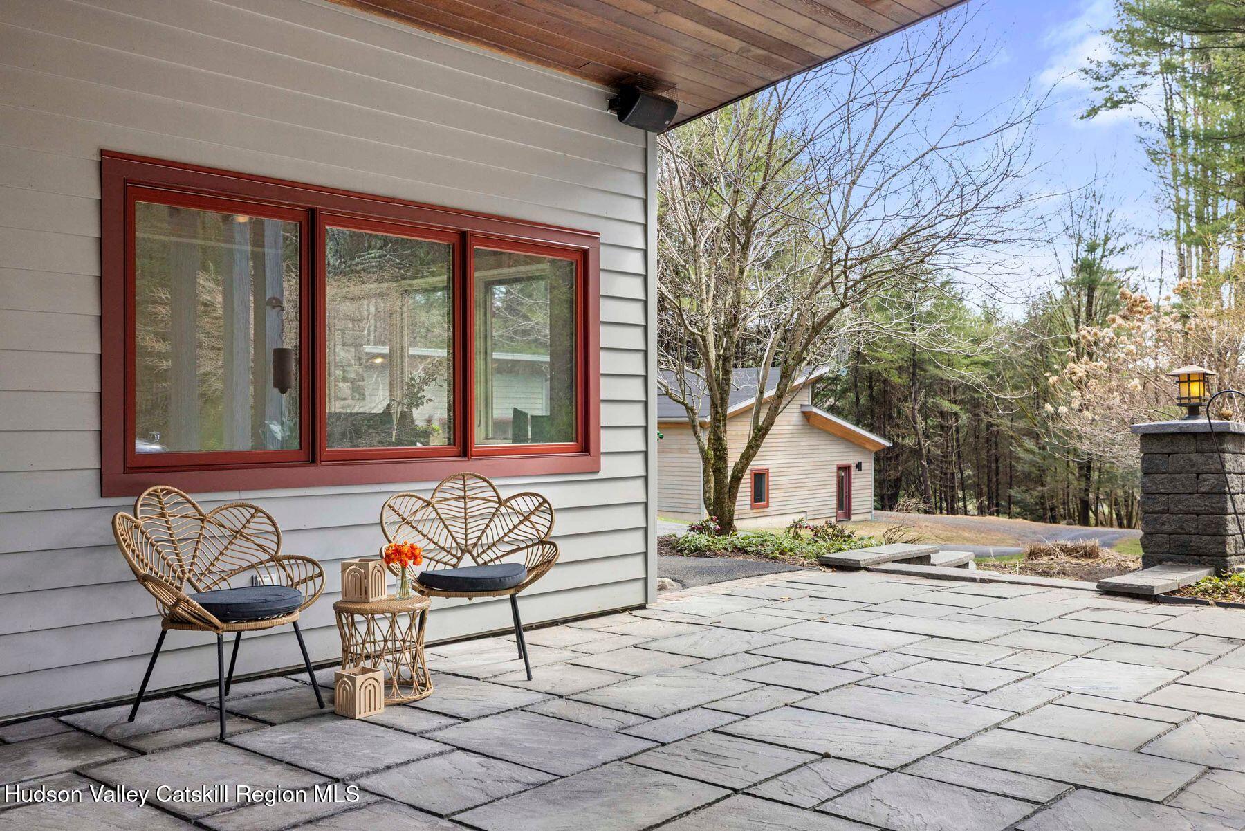 41 Shultis Farm Road Bearsville, NY 12409 - Photo 40 of 47 a roof deck with table and chairs and potted plants