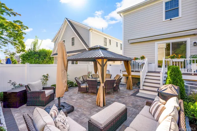 a view of a deck with wooden floor and outer view