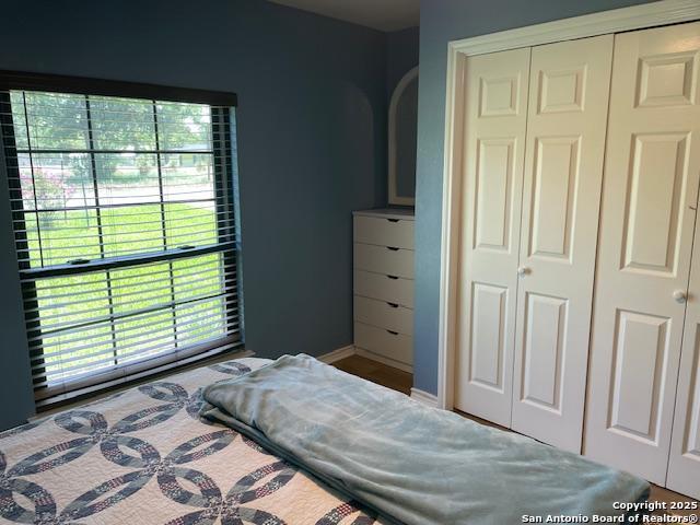 400 North Chaparral Burnet, TX 78611 - Photo 13 of 24 a bedroom with a bed and a window