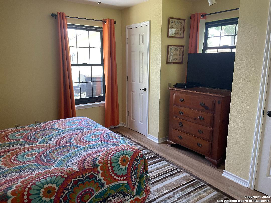 400 North Chaparral Burnet, TX 78611 - Photo 15 of 24 a bedroom with a bed and a window