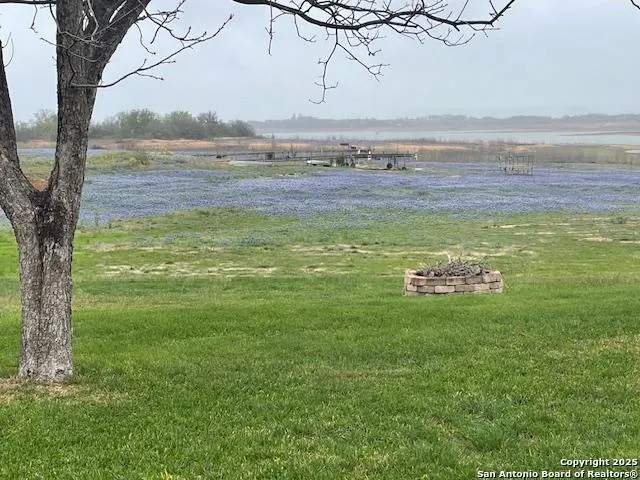 a view of a lake with a beach