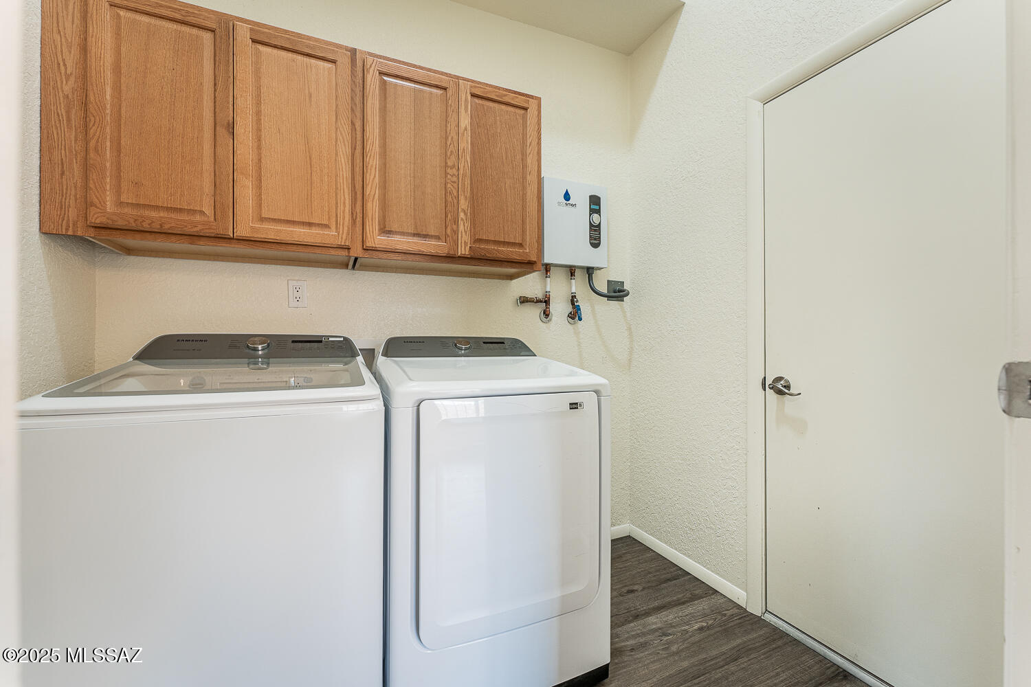 931 West Rio Guaymas Green Valley, AZ 85614 - Photo 16 of 39 a utility room with dryer and washer