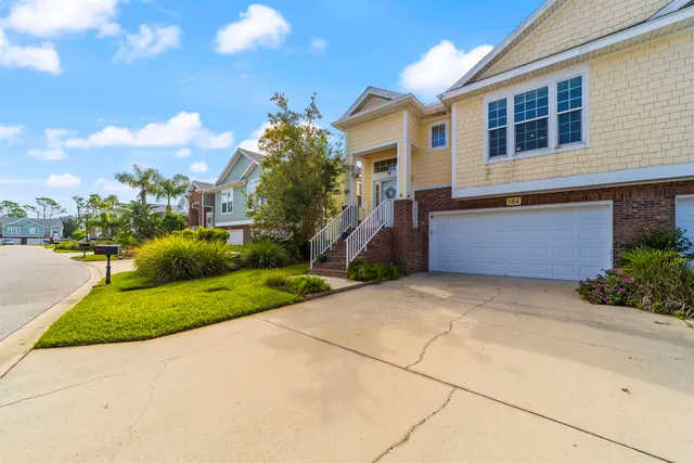 a house view with a garden space