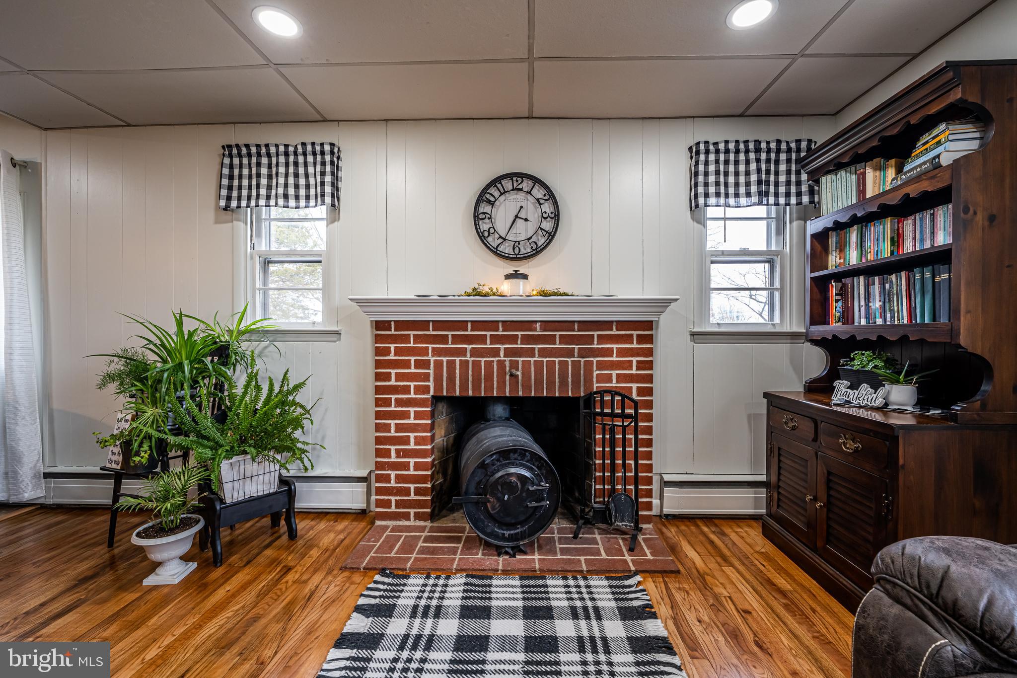 3131 Little Road Perkiomenville, PA 18074 - Photo 9 of 22 Living room with brick fireplace