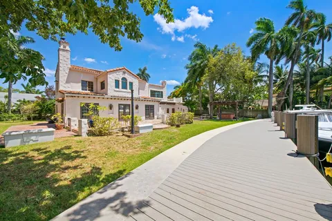 a front view of a house with swimming pool