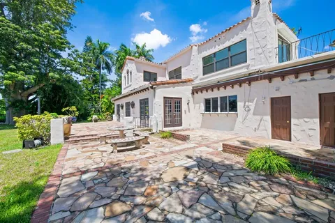 a front view of a house with a porch