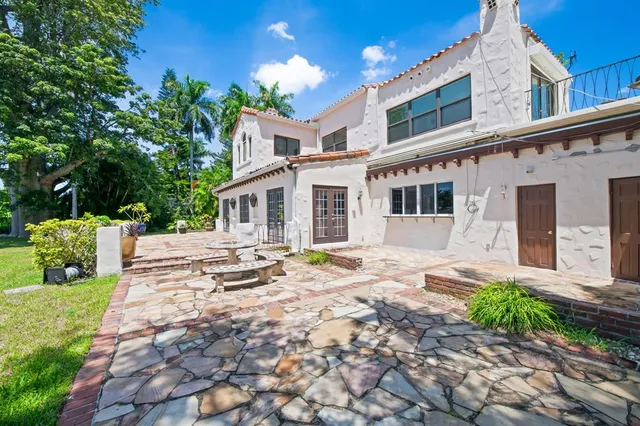 a front view of a house with a porch