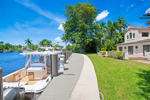 a view of a patio with swimming pool