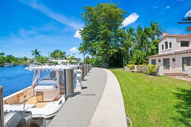 a view of a patio with swimming pool