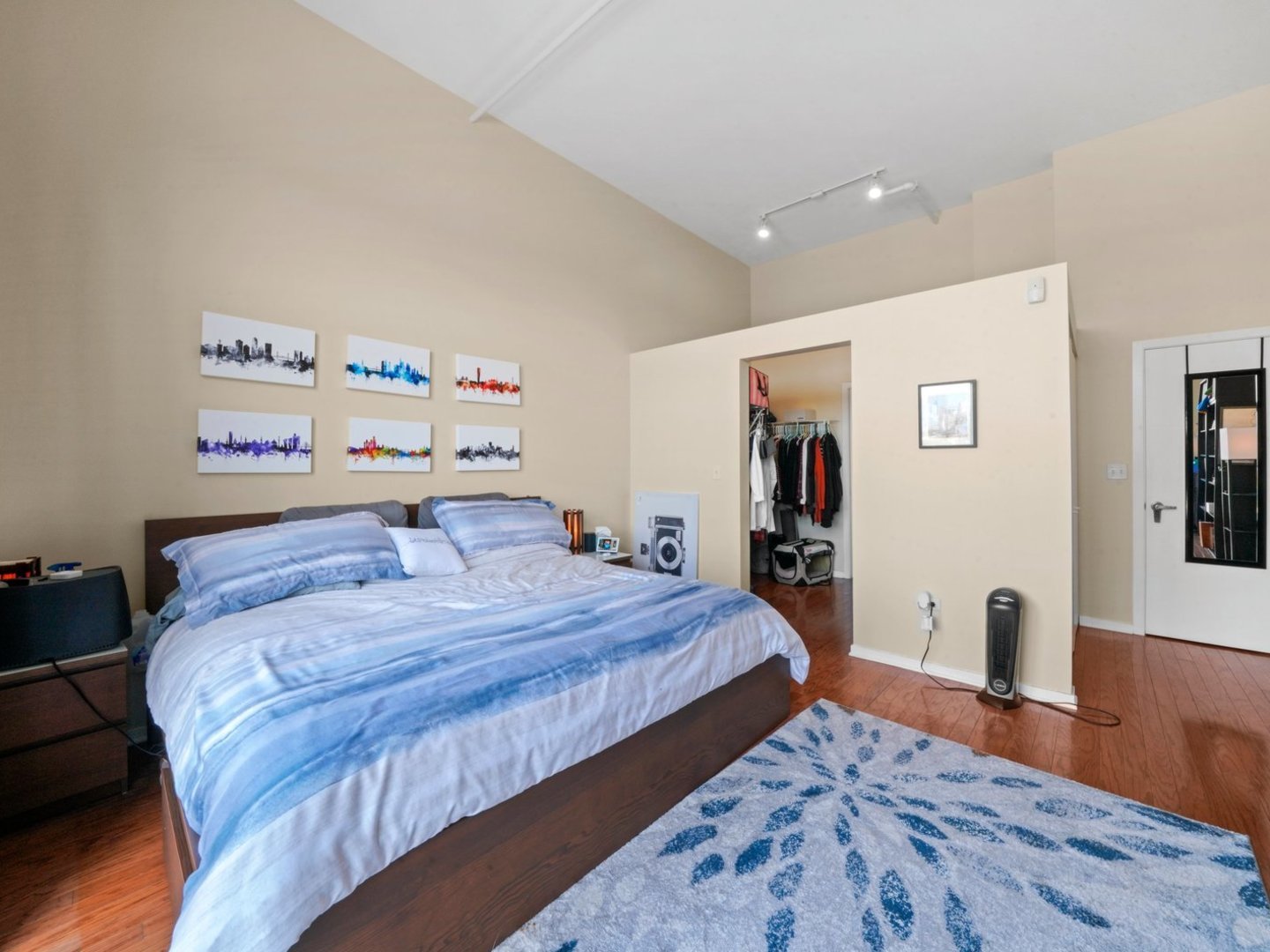 1525 South Sangamon Street, Unit 802P Chicago, IL 60608 - Photo 16 of 32 a bedroom with bed and a desk